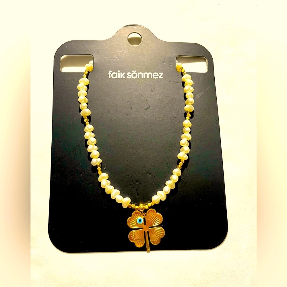 New Faik Sonmez beaded white  necklace with gold pendant .